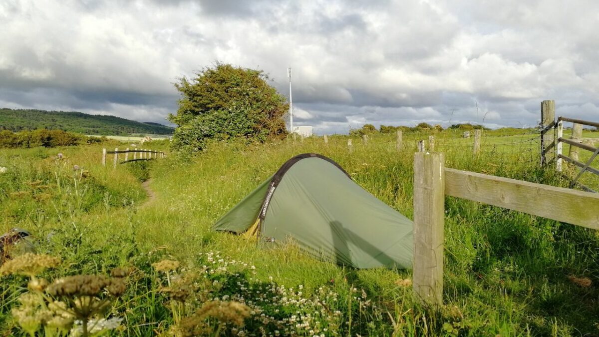 A tent on a grassy field in England