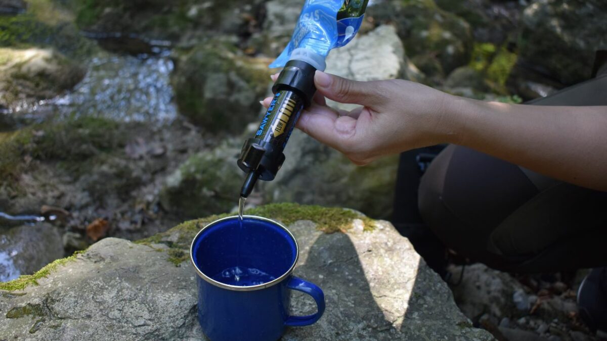 Wild camper filtering water