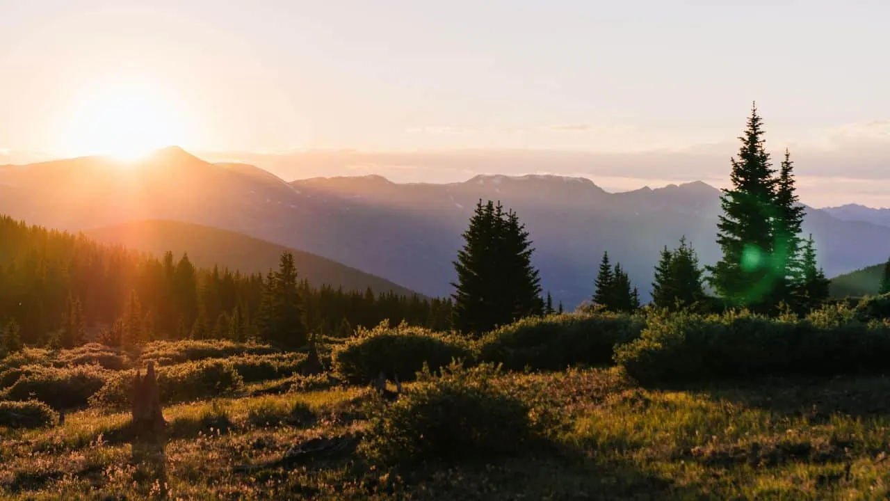 Sun rays at sunset up in the mountains near Boreas Pass road