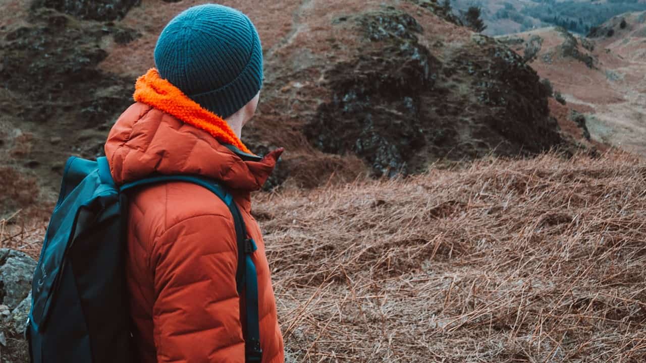 Hiker in a red down jacket